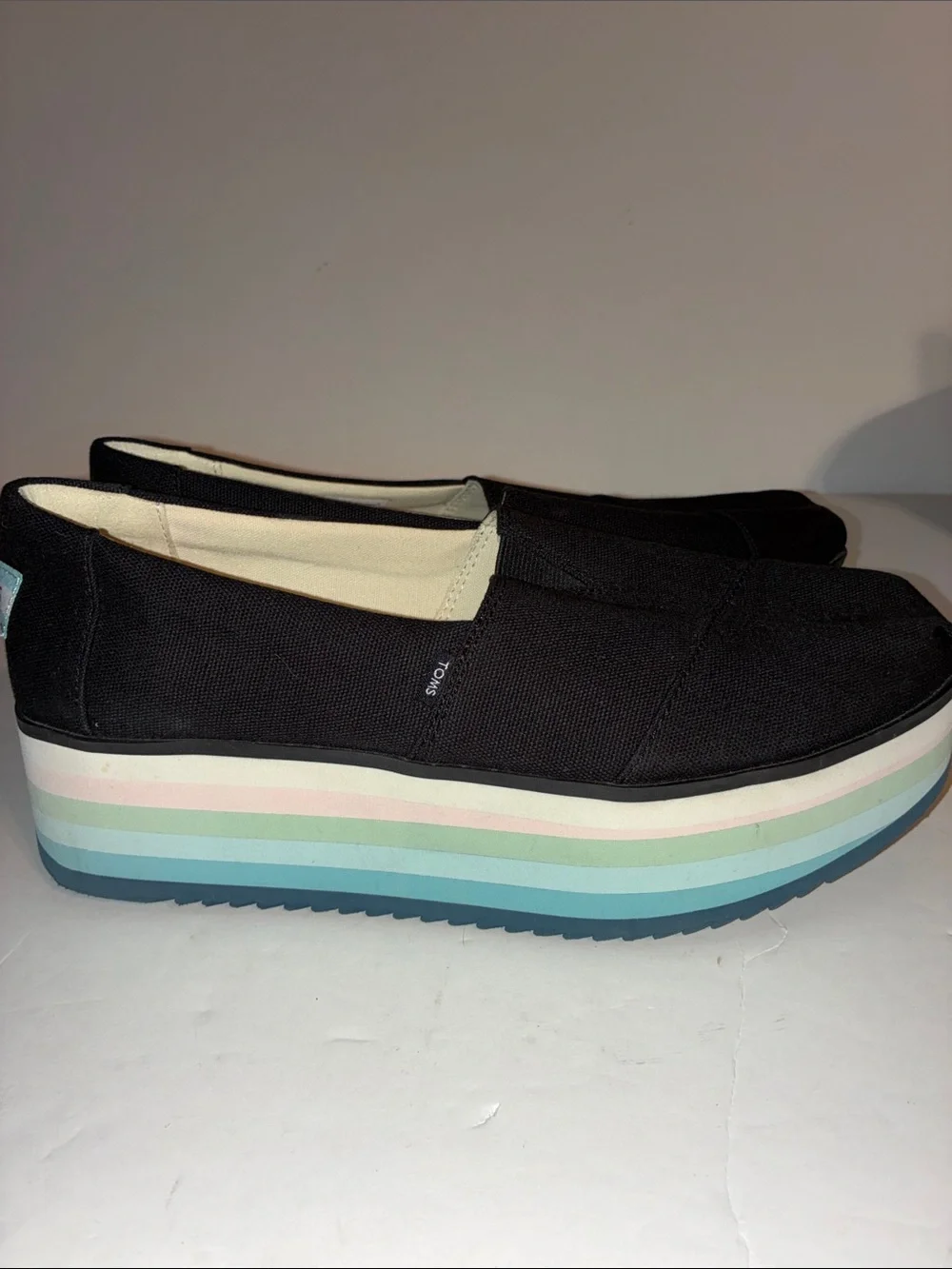 TOMS, Women’s 8.5, Black Canvas Platform Slip-Ons with Pastel Striped Sole